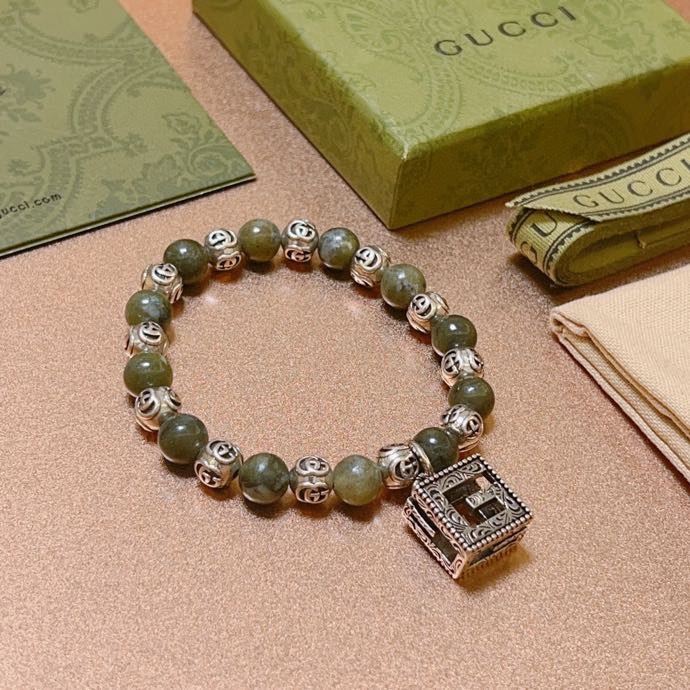 G*u*i bracelets